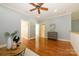 Cozy living room featuring hardwood floors and neutral paint at 6312 Mission Pl, Charlotte, NC 28210