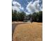A lovely two-story home with a paved driveway and lush greenery providing a private setting at 910 Westminster Dr, Statesville, NC 28677