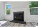 Fireplace with white mantle at 910 Westminster Dr, Statesville, NC 28677