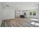 Modern kitchen with pendant lighting, island, and stainless appliances at 910 Westminster Dr, Statesville, NC 28677