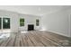 Bright living room with fireplace at 910 Westminster Dr, Statesville, NC 28677