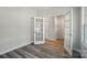 Spacious office with hardwood floors, glass doors, and lots of natural light at 910 Westminster Dr, Statesville, NC 28677