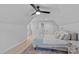 Comfortable bedroom with light hardwood floors and abundant natural light at 9564 Regent Dr, Davidson, NC 28036