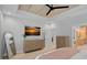 Cozy bedroom with a bed, dresser, and an ensuite bathroom with a double vanity sink at 9564 Regent Dr, Davidson, NC 28036