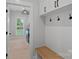Well-organized mudroom featuring built-in storage, hooks, and a convenient bench at 9564 Regent Dr, Davidson, NC 28036