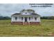 Charming single-story home featuring a covered front porch and a well-maintained yard at Tbd Alf Hoover Rd # 4, Lincolnton, NC 28092