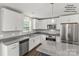 Modern kitchen featuring stainless steel appliances, granite countertops, and white cabinetry at Tbd Alf Hoover Rd # 4, Lincolnton, NC 28092