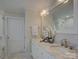 Elegant bathroom features marble countertops, dual sinks and a glass-enclosed shower at 1069 Sedgefield Rd, Charlotte, NC 28209