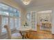 Charming breakfast nook with natural light and shuttered windows at 1069 Sedgefield Rd, Charlotte, NC 28209