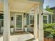 Charming front entrance with decorative columns, a stone walkway, and well-manicured landscaping for a welcoming appeal at 1069 Sedgefield Rd, Charlotte, NC 28209