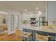 Bright kitchen with stainless steel appliances and counter seating at 1069 Sedgefield Rd, Charlotte, NC 28209