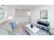 Comfortable living room with a neutral color palette and plenty of natural light at 123 Rustling Waters Dr, Mooresville, NC 28117
