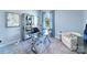 Stylish office featuring a glass-top desk, a comfortable chair, and modern decor and lighting at 123 Rustling Waters Dr, Mooresville, NC 28117