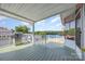 Spacious deck with a grill and a view of the lake at 125 Maple St, New London, NC 28127