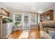 Bright entryway featuring wood floors, neutral walls, and windows that illuminate the space with natural light at 125 Maple St, New London, NC 28127