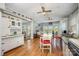 Open floor plan with living, dining, and kitchen areas, creating a seamless flow with bright, natural light at 125 Maple St, New London, NC 28127