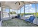 Relaxing screened porch overlooking the lake at 125 Maple St, New London, NC 28127