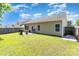 The property features a well-manicured backyard with an outdoor grill, patio, and a privacy fence at 12792 Clydesdale Dr, Midland, NC 28107