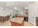 Open kitchen with an island, wood cabinets, stainless steel appliances and a dining area at 12792 Clydesdale Dr, Midland, NC 28107