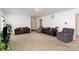 View of the living room showcasing neutral walls and carpet, and comfortable furniture for relaxation at 12792 Clydesdale Dr, Midland, NC 28107