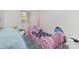 bedroom with pink carriage bed and light gray vinyl flooring at 128 Paul Snipes Rd, Lancaster, SC 29720