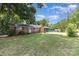 Spacious lawn surrounds this single story house, brick chimney, and covered porch at 128 Paul Snipes Rd, Lancaster, SC 29720