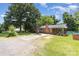 Lovely single-story brick home with a sprawling lawn and covered porch area at 128 Paul Snipes Rd, Lancaster, SC 29720
