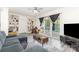 Comfortable living area with lots of light, sliding doors, and built-in shelving at 128 Paul Snipes Rd, Lancaster, SC 29720