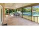 Covered patio with a table and chairs, overlooking the fenced backyard with pool at 128 Paul Snipes Rd, Lancaster, SC 29720