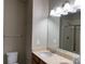 Bright bathroom with double sinks, modern fixtures, and a glass-enclosed shower at 13838 Winmau Ln, Huntersville, NC 28078