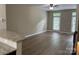 Spacious living room with hardwood floors and outdoor access, perfect for entertaining at 13838 Winmau Ln, Huntersville, NC 28078
