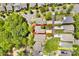 Aerial view showcasing a charming home with a well-maintained yard, nestled in a peaceful residential neighborhood at 14940 Carbert Ln, Huntersville, NC 28078