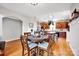 Open concept kitchen features a central island and casual dining area at 14940 Carbert Ln, Huntersville, NC 28078