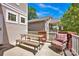 Charming patio area with picnic table and outdoor seating, perfect for entertaining at 14940 Carbert Ln, Huntersville, NC 28078