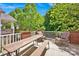 Enjoy outdoor dining on this covered patio featuring ample seating at 14940 Carbert Ln, Huntersville, NC 28078