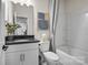 Bathroom features a modern vanity, a combination shower and bathtub, and contemporary fixtures at 15008 Meadows Hunt Ln # 156, Huntersville, NC 28078