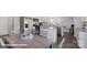 Bright kitchen featuring stainless steel appliances, granite countertops, and an island at 155 Rustling Waters Dr, Mooresville, NC 28117