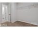 Functional walk-in closet with rod and shelf, ready for organization and storage at 155 Rustling Waters Dr, Mooresville, NC 28117