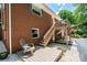 Backyard view showing a charming deck and a brick facade at 1602 Brentwood Dr, Newton, NC 28658