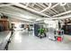 Finished basement space featuring work out equipment, a motorcycle, and plenty of storage at 1602 Brentwood Dr, Newton, NC 28658