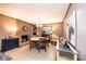Traditional dining room features a brick fireplace, built-in shelves, and a round dining table at 1602 Brentwood Dr, Newton, NC 28658