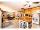 Open concept featuring a dining and kitchen with a kitchen island and stainless steel appliances at 1602 Brentwood Dr, Newton, NC 28658
