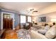 Cozy living room with hardwood floors, comfortable seating, and an area rug at 1602 Brentwood Dr, Newton, NC 28658