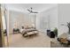 Bright bedroom with plantation shutters, ceiling fan and neutral decor at 17416 Gillican Overlook Rd, Davidson, NC 28036