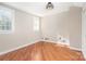 Charming bedroom featuring hardwood floors, natural light, and closet at 1809 The Plaza None, Charlotte, NC 28205