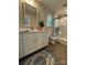 Stylish bathroom featuring white cabinets, granite countertops, and a glass-enclosed shower at 2012 Crown Point Dr # A, Albemarle, NC 28001