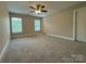 Spacious bedroom featuring two windows and plush carpeting, perfect for relaxation at 2012 Crown Point Dr # A, Albemarle, NC 28001