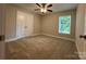 Comfortable bedroom featuring a closet and natural light from a window at 2012 Crown Point Dr # A, Albemarle, NC 28001