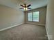 Spacious bedroom with two windows that offers natural light and comfort at 2012 Crown Point Dr # A, Albemarle, NC 28001