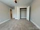 Bedroom with large closet and entry to another room; ready for personal touches at 2012 Crown Point Dr # A, Albemarle, NC 28001